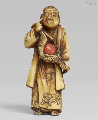 An ivory netsuke of a boy with a hozuki. Late 19th century