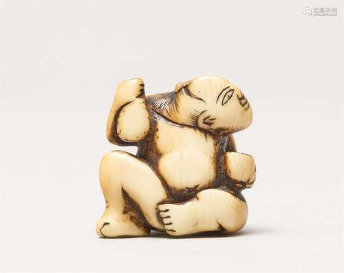 An ivory netsuke of a sumo wrestler. Early 19th century