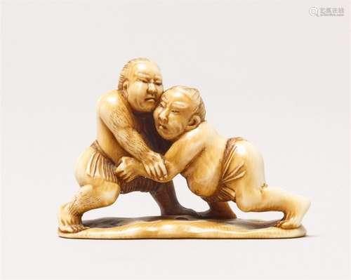 A fine ivory netsuke of two sumotori. Second half 19th centu...