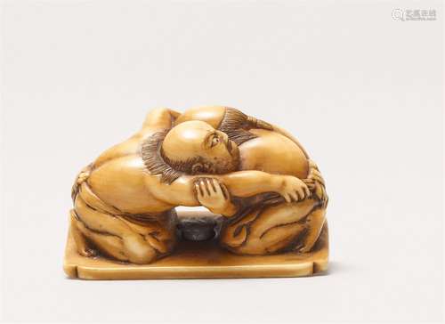 An ivory netsuke of two sumo wrestlers. Second half 19th cen...