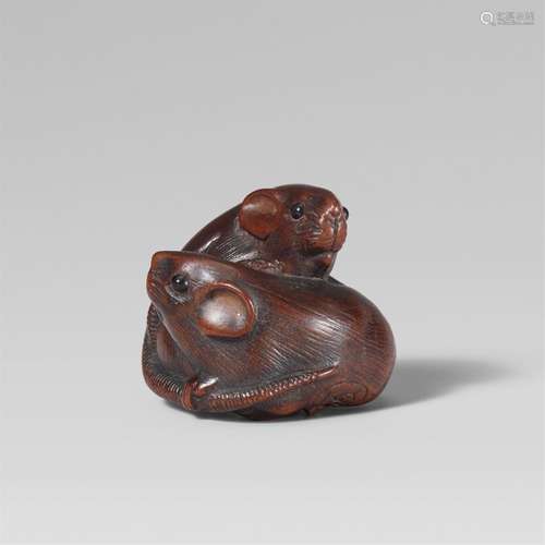 A fine boxwood Nagoya school netsuke of two rats. Mid-19th c...