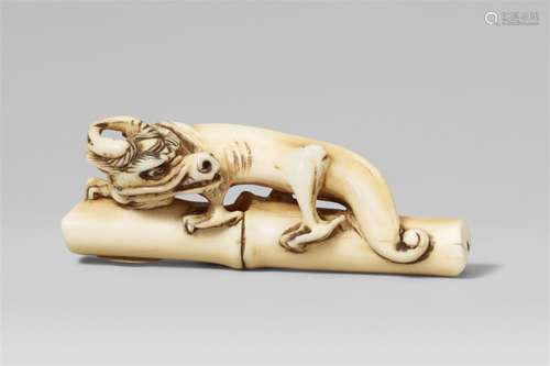 An unusual ivory netsuke of a two-horned amaryu. 18th centur...