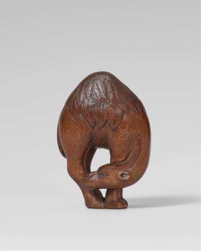 A wood netsuke of an Arabian dromedary. Probably 20th centur...