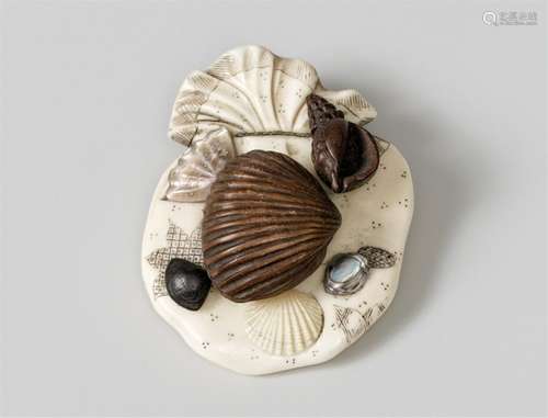 A Shibayama-type ivory and wood netsuke of takaramono and sh...