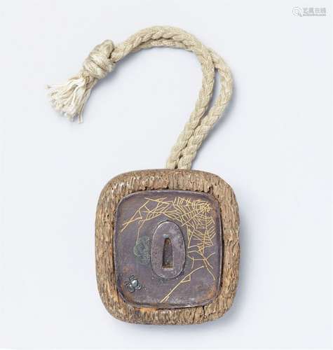 A rare kagamibuta netsuke of a tsuba. Second half 19th centu...