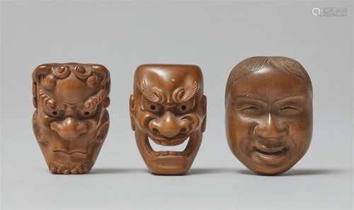 Three boxwood mask netsuke from a set. Around 1900