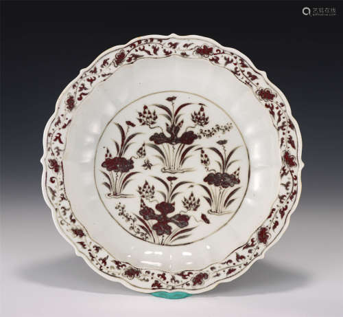 A CHINESE RED UNDERGLAZED PORCELAIN PLATE