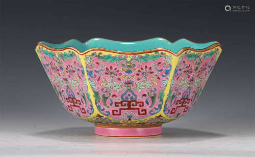 A CHINESE YELLOW BOTTOM FAMILLE ROSE PORCELAIN BOWL