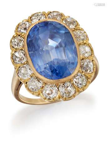 A SAPPHIRE AND DIAMOND CLUSTER RING