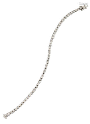 AN 18 CARAT WHITE GOLD DIAMOND LINE BRACELET