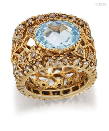 A BLUE TOPAZ AND DIAMOND DRESS RING