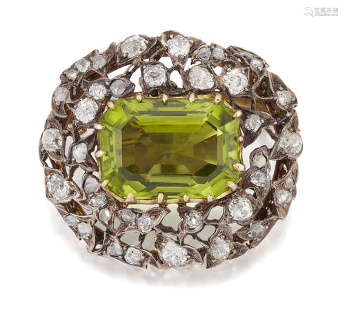 A PERIDOT AND DIAMOND BROOCH