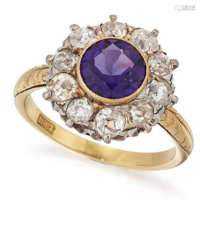 AN AMETHYST AND DIAMOND CLUSTER RING