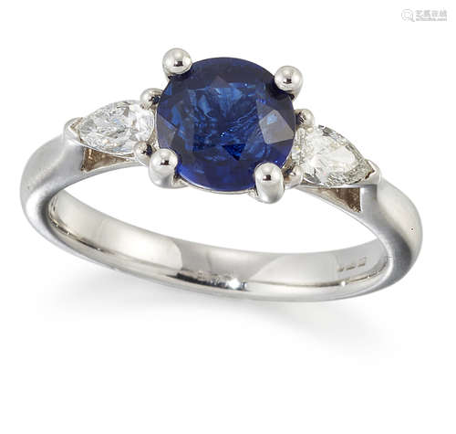 AN 18 CARAT WHITE GOLD SAPPHIRE AND DIAMOND THREE-STONE RING