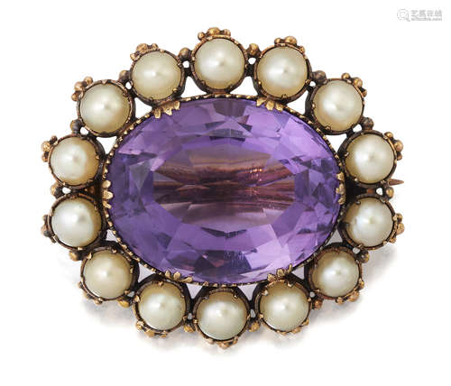 AN AMETHYST AND PEARL BROOCH