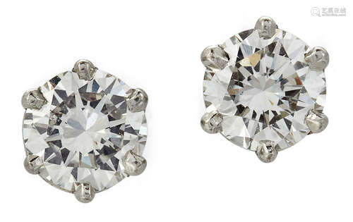 A PAIR OF 18 CARAT WHITE GOLD DIAMOND SINGLE-STONE STUD EARR...