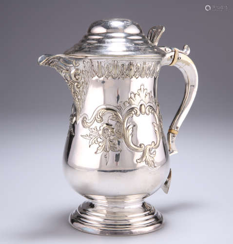 A 19TH CENTURY SILVER-PLATED FLAGON