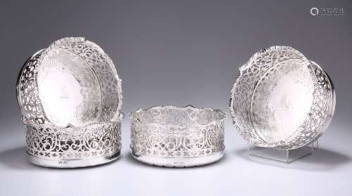 AN EXCEPTIONAL SET OF FOUR EARLY VICTORIAN SILVER COASTERS