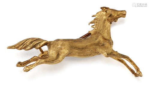 A 9 CARAT GOLD HORSE BROOCH