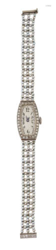 A LADY'S ART DECO DIAMOND AND PEARL BRACELET WATCH