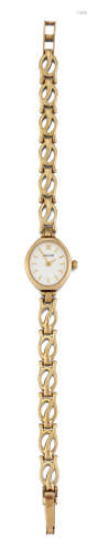 A LADY'S 9 CARAT GOLD ACCURIST BRACELET WATCH