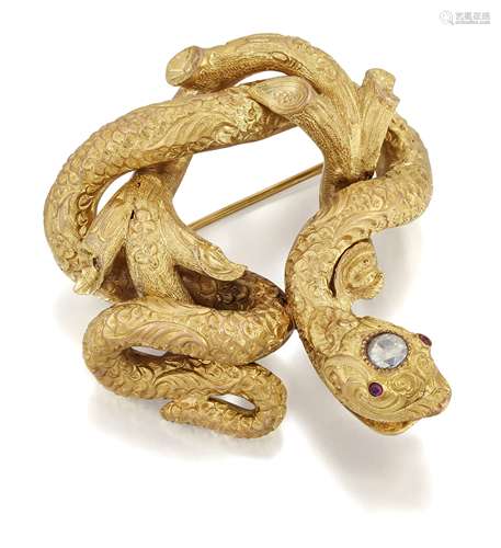 A DIAMOND AND RUBY SNAKE BROOCH