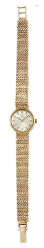 A LADY'S 9 CARAT GOLD OMEGA BRACELET WATCH