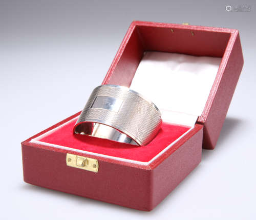 AN ELIZABETH II SILVER NAPKIN RING