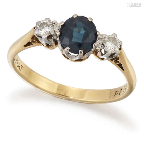 A SAPPHIRE AND DIAMOND THREE-STONE RING