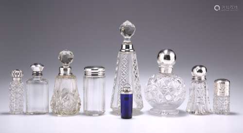 A GROUP OF SIX SILVER-MOUNTED GLASS SCENT BOTTLES AND FLASKS