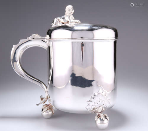 A VICTORIAN SILVER LIDDED TANKARD OF SUBSTANTIAL PROPORTIONS