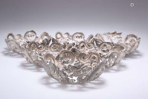 A HARLEQUIN SET OF SIX CHINESE SILVER BOWL MOUNTS