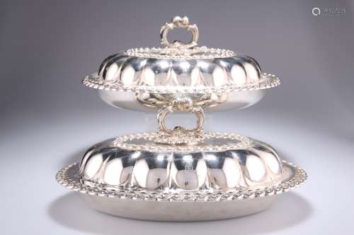 A PAIR OF 19TH CENTURY SILVER-PLATED ENTREE DISHES
