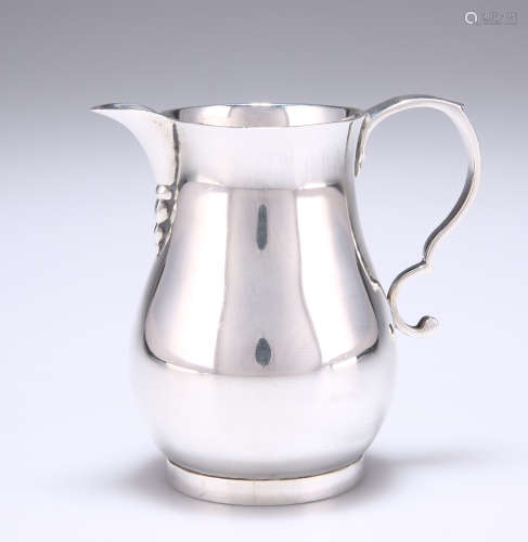 A GEORGE V SILVER CREAM JUG