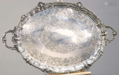 A LARGE VICTORIAN SILVER-PLATED TWO-HANDLED TRAY