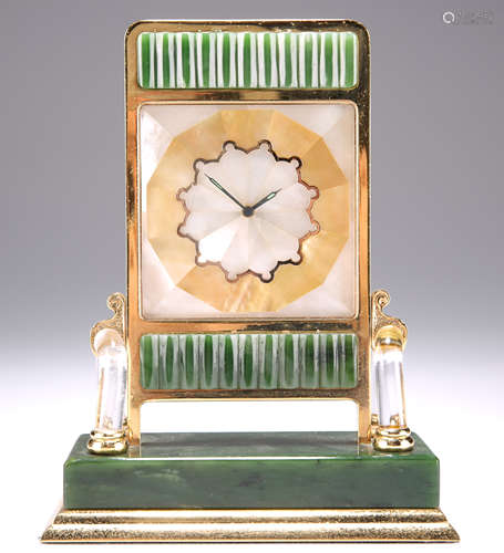 A ROCK CRYSTAL AND NEPHRITE JADE CLOCK, IN THE MANNER OF CAR...