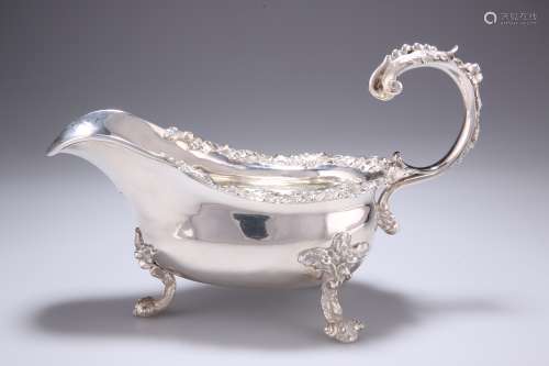 A LARGE GEORGE IV CAST SILVER SAUCE BOAT