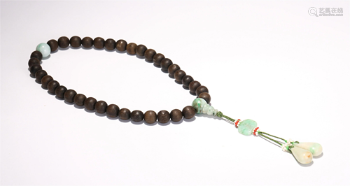 A CHINESE AGARWOOD PRAYERS BEADS