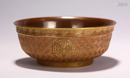 A CHINESE CORAL GLAZED PORCELAIN BOWL