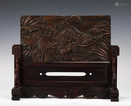 A CHINESE CARVED AGARWOOD TABLE SCREEN