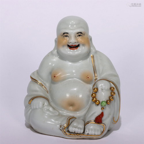 A CHINESE BIONIC GLAZED PORCELAIN FIGURE OF BUDDHA