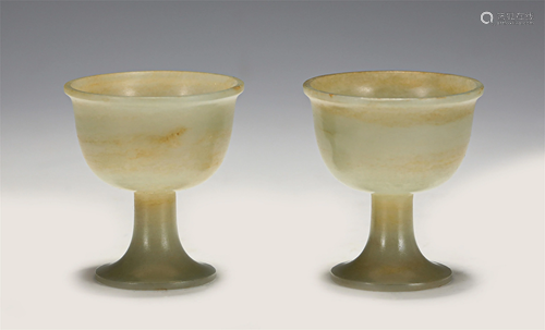 A PAIR OF CHINESE CARVED JADE CUPS