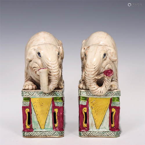 A PAIR OF CHINESE FAMILLE ROSE PORCELAIN ELEPHANTS