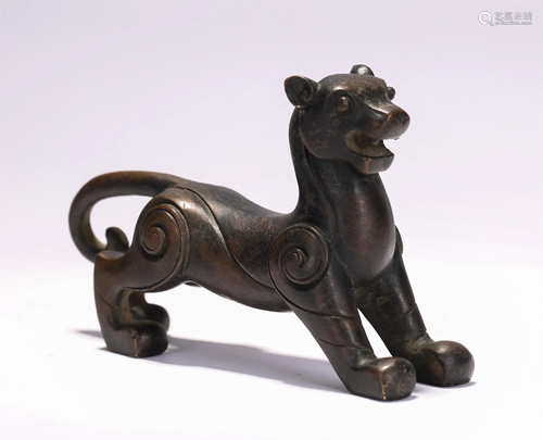 A CHINESE BRONZE FOO-DOG DECORATION