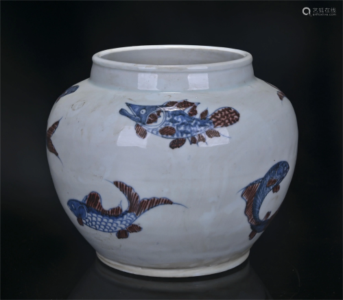 A CHINESE BLUE AND WHITE UNDERGLAZED RED VASE