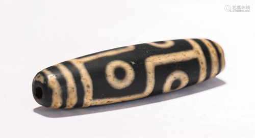 A CHINESE DZI SIX CIRCLE BEAD