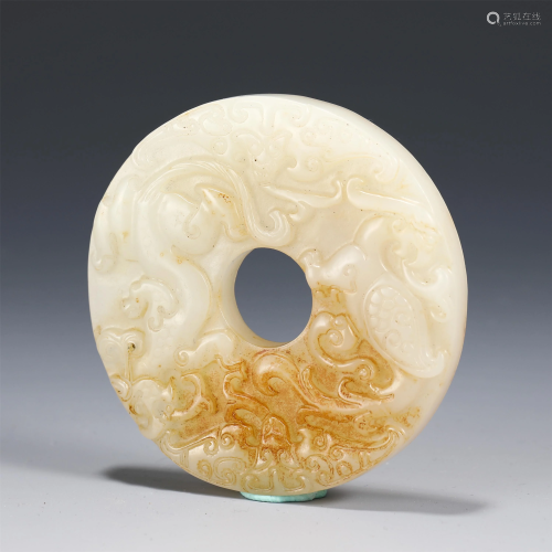 A CHINESE ROUND JADE PLAQUE