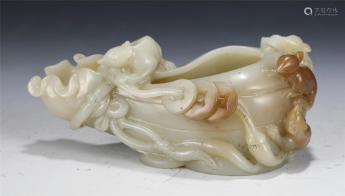 A CHINESE CARVED JADE WASHER