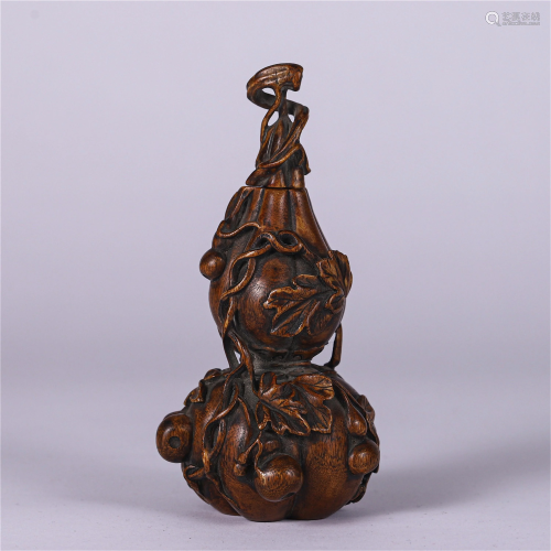 A CHINESE CARVED BOXWOOD GOURD DECORATION