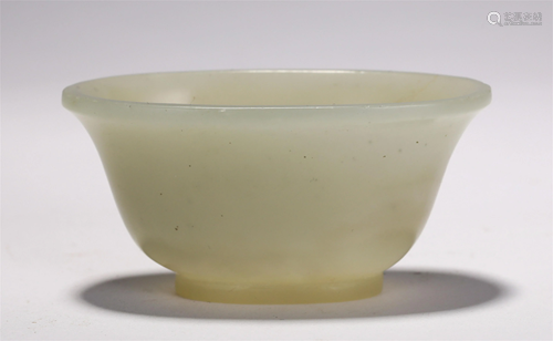 A CHINESE CARVED JADE CUP